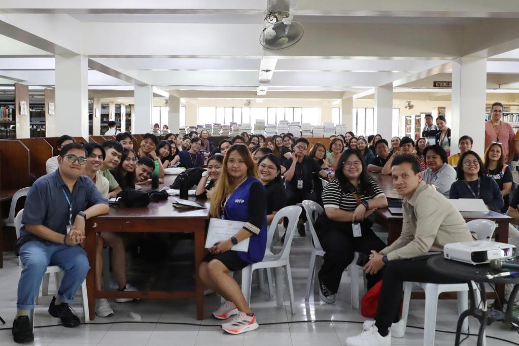 A group of people inside a library