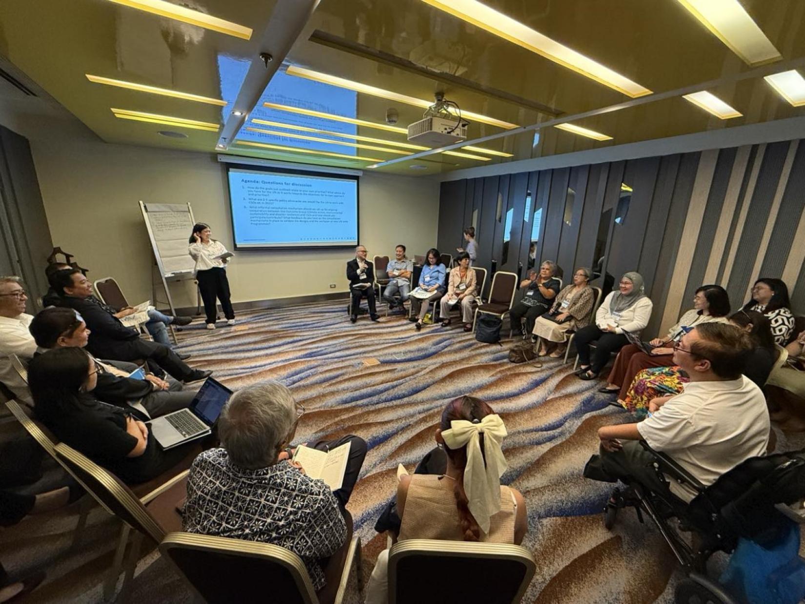 CSO representatives engage in discussions during the breakout sessions of the UN CSO Forum