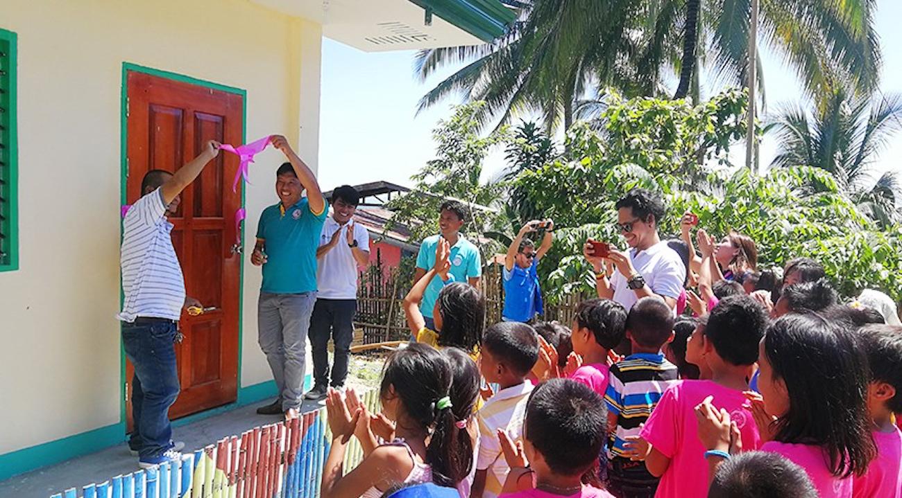 Students celebrate reopening of the Pinamuno Elementary School