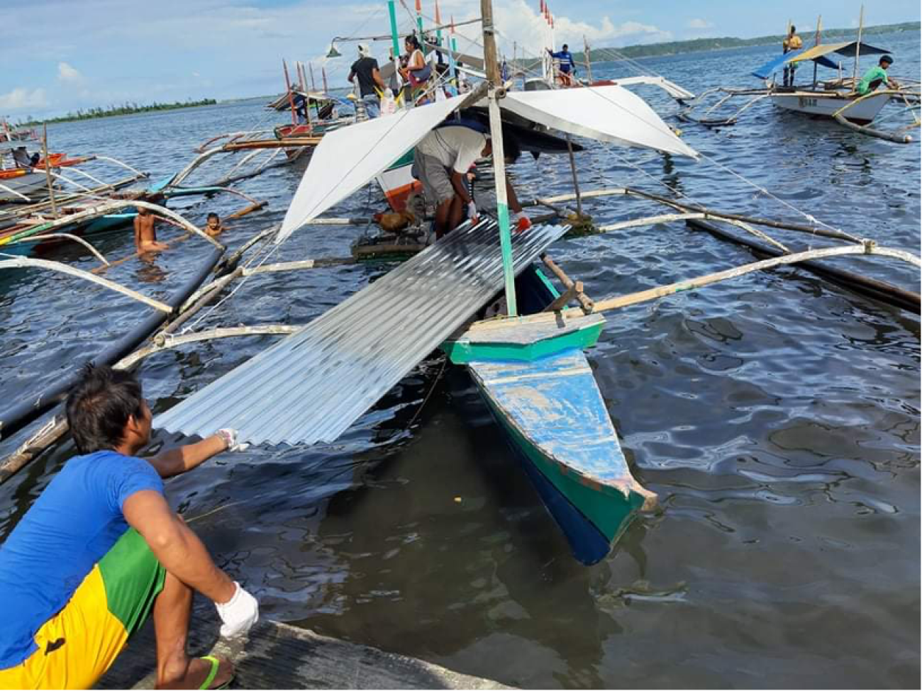 IOM-CERF SRK Distribution to 235 families in island Barangays Angas and Rawis, Tabaco, Albay 29 December 2020