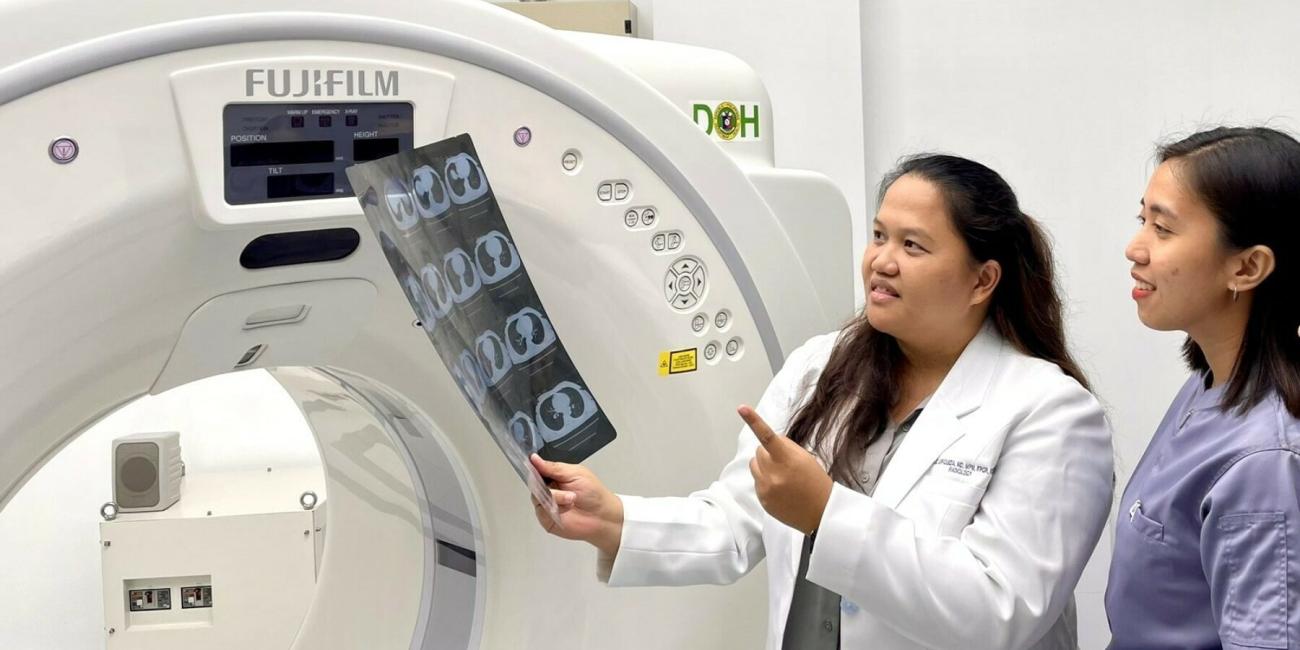 Female doctor explaining CT scan result to patient