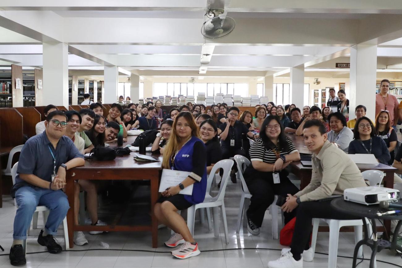 A group of people inside a library